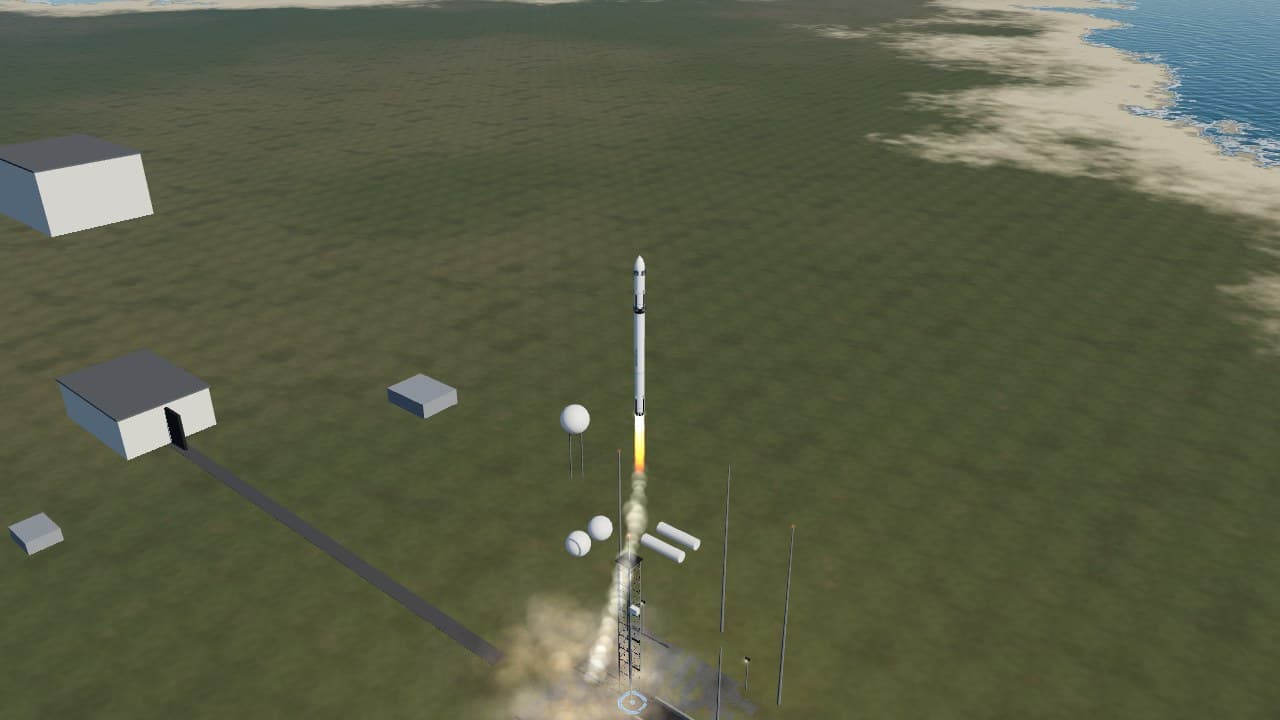 An Aster launch vehicle rising off the pad at Starbase on its exhaust, the launch complex below it